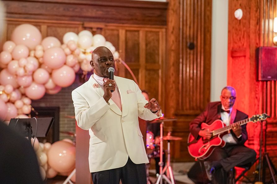 Bobby Nicholas performs for a crowd of more than 200 attendees at the Pink Party.