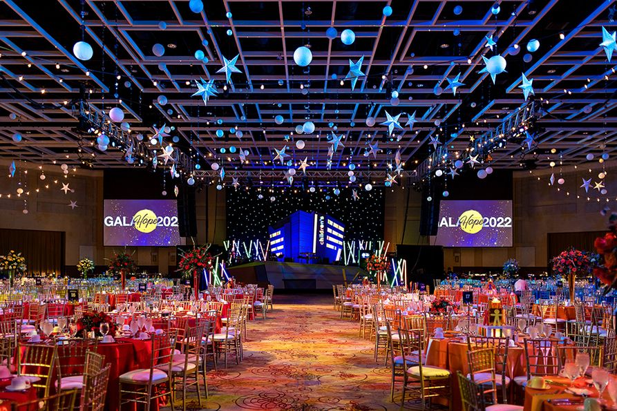 Wide shot of decorated ballroom and tables
