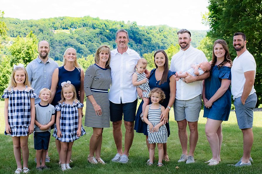The Hostetler family includes (from left) Jason and Amy Hostetler and family, Vicky and Jeff Hostetler, Abby and Tyler Hostetler and family, and Ashley and Justin Hostetler.