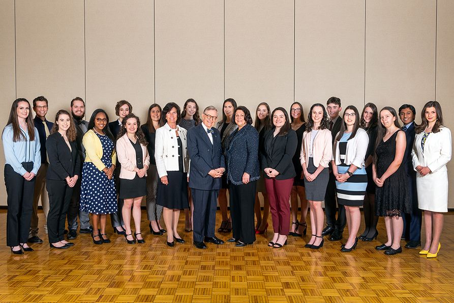 The 2019 WVU Bucklew Scholars meet with President Gordon Gee, center, who is flanked by Provost Joyce McConnell on his left and Cindi Roth, president of the WVU Foundation, on his right.