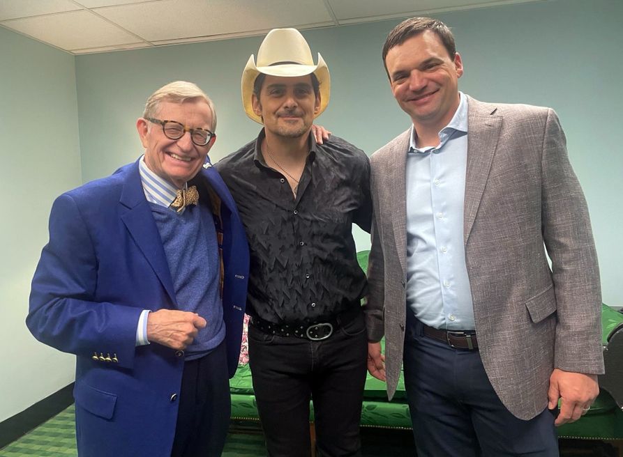 2.	WVU President E. Gordon Gee poses with country superstar Brad Paisley and WVU Head Football Coach Neal Brown at the WVU Cancer Institute’s Spring Gala at The Greenbrier Resort.