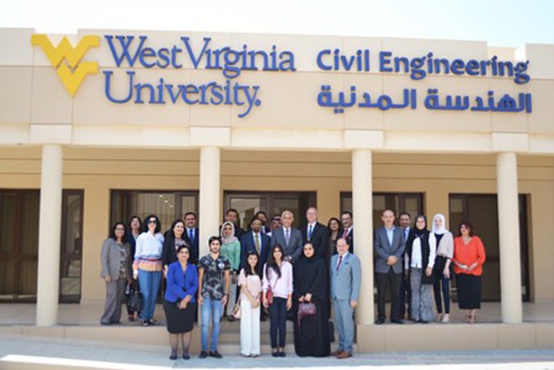 Supporters and students standing in front of the WVU-RUW Global Portal.