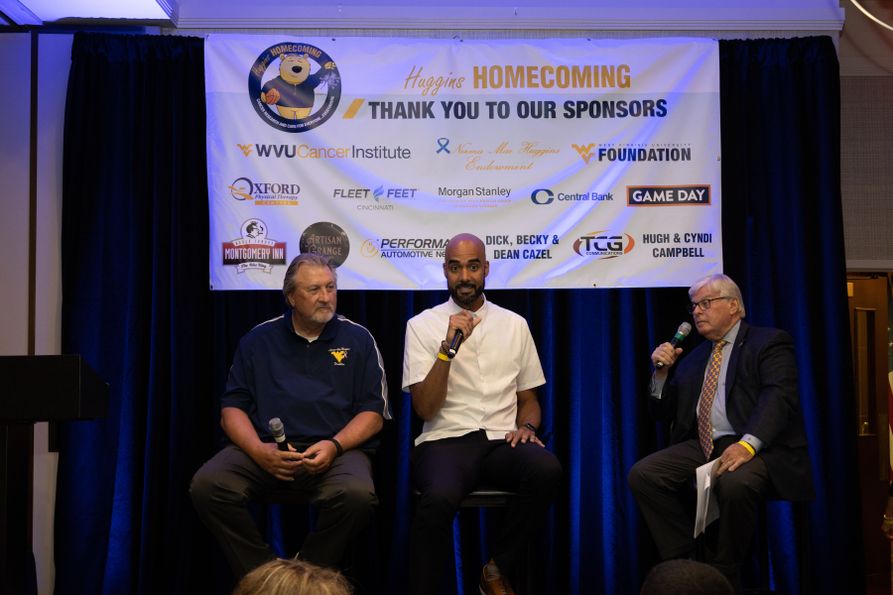 1.	Bob Huggins (from left) welcomed former WVU basketball standout Rob Summers as a special guest for Huggins Homecoming, emceed by Dennis Janson.
