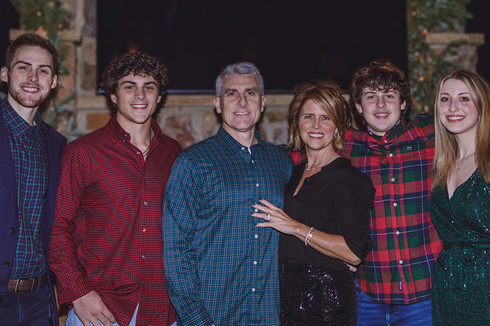 Rusty and Kimberly Hutson (at center) pose with children (from left) Conner, Parker, Tanner and Hannah.