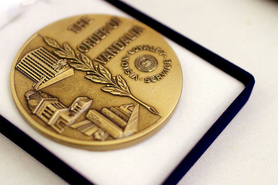 The Order of Vandalia originated in 1960 when WVU President Elvis J. Stahr outlined his idea for a special honor to be bestowed on the University’s most loyal servants.
