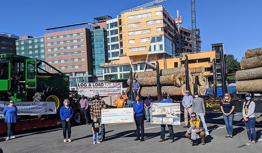 The Mountain Loggers Group presented a check to WVU Medicine Children’s on Saturday, Nov. 7, following the annual Log-A-Load for Kids Auction.